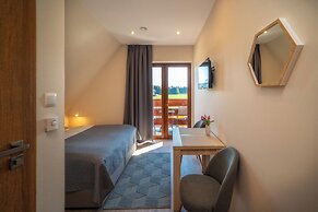 PRZY TERMACH - Pokoje Apartamenty Domki