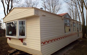 Mobile Home im Ferienpark mit Seezugang