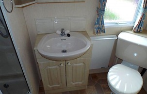 Mobile Home im Ferienpark mit Seezugang