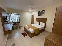 SriLakshmitulasiresidency by pickurstay