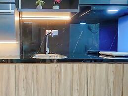 Blue Accent Studio At Delft Ciputra Makassar Apartment