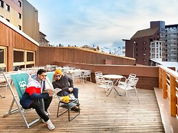 Living for Three in the Heart of Huez