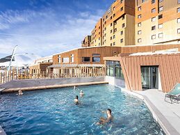 Living for Three in the Heart of Huez
