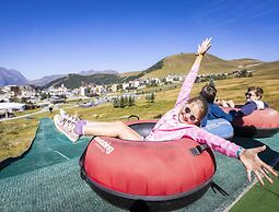 Living for Three in the Heart of Huez