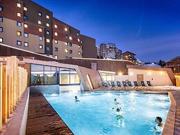 Living for Three in the Heart of Huez