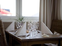 Heikendorf Penthouse Suite by Belvilla