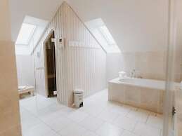 Heikendorf Penthouse Suite by Belvilla