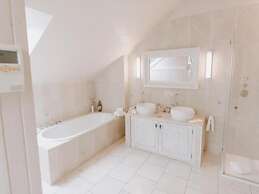 Heikendorf Penthouse Suite by Belvilla