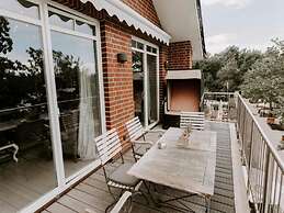 Heikendorf Penthouse Suite by Belvilla
