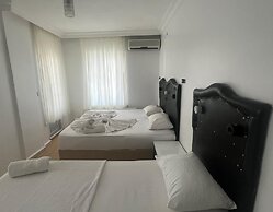 Merkez Pansiyon Sarımsaklı