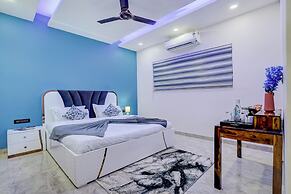 ELIVAAS Amaltas 4BHK Hideaway With Pool