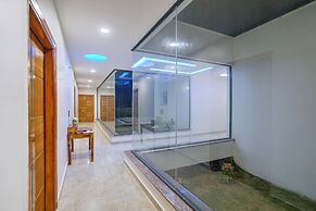 ELIVAAS Amaltas 4BHK Hideaway With Pool