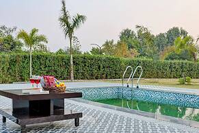 ELIVAAS Amaltas 4BHK Hideaway With Pool