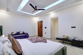 ELIVAAS Amaltas 4BHK Hideaway With Pool