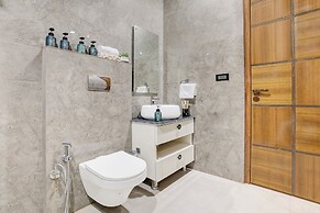 ELIVAAS Amaltas 4BHK Hideaway With Pool
