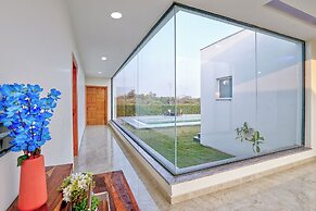 ELIVAAS Amaltas 4BHK Hideaway With Pool