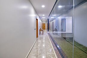 ELIVAAS Amaltas 4BHK Hideaway With Pool