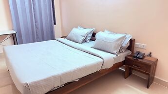 Cozy Den Hotel