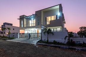 ELIVAAS 3BHK White House Villa with View