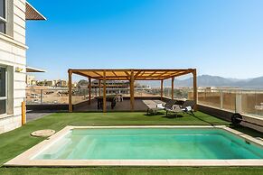 Sunny Rooftop Poolside Panoramic View
