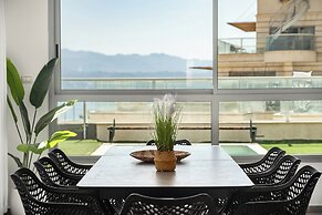 Sunny Rooftop Poolside Panoramic View