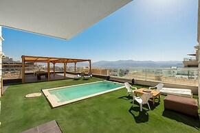 Sunny Rooftop Poolside Panoramic View