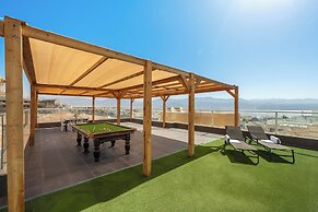 Sunny Rooftop Poolside Panoramic View