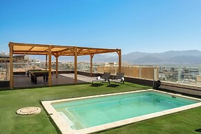 Sunny Rooftop Poolside Panoramic View