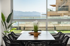 Sunny Rooftop Poolside Panoramic View