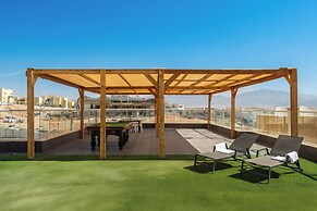 Sunny Rooftop Poolside Panoramic View