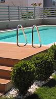 Sagma Maisonette with pool and garden