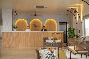Aura Inn & Suites