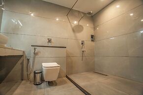 Aura Inn & Suites