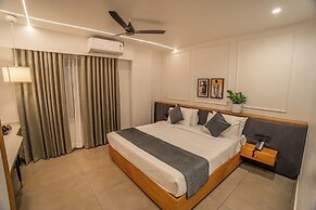 Aura Inn & Suites
