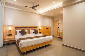 Aura Inn & Suites