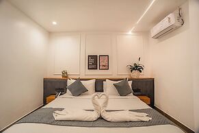 Aura Inn & Suites
