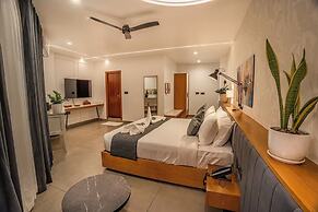 Aura Inn & Suites
