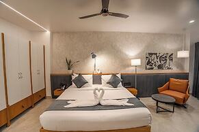 Aura Inn & Suites