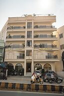 Aura Inn & Suites