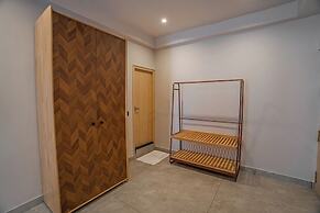 Aura Inn & Suites