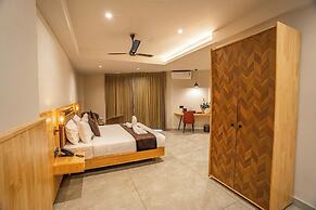 Aura Inn & Suites