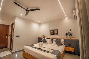 Aura Inn & Suites