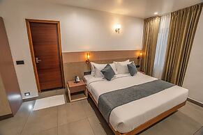Aura Inn & Suites