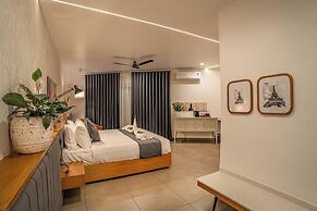 Aura Inn & Suites