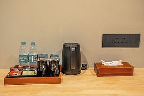 Aura Inn & Suites