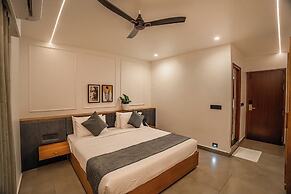Aura Inn & Suites