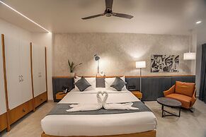 Aura Inn & Suites