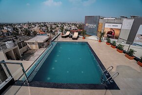 Aura Inn & Suites