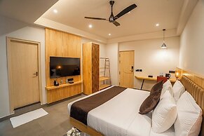 Aura Inn & Suites