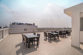 Aura Inn & Suites